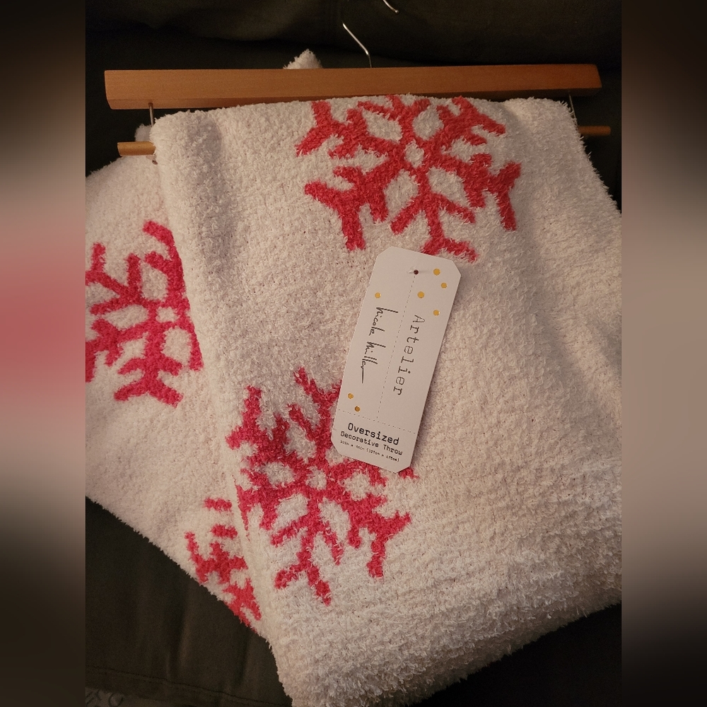 Nicole Miller pink and white snowflake blanket